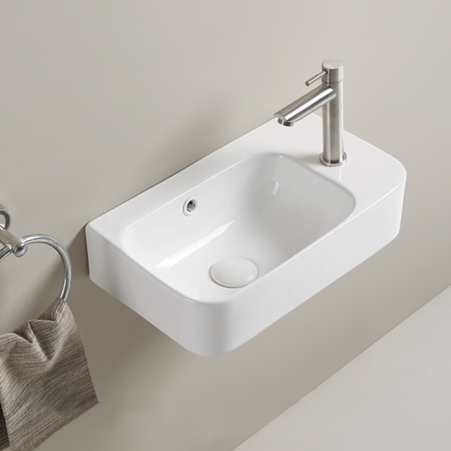 Подвесная мини раковина для гостевого санузла Comforty CF178578L чаша слева